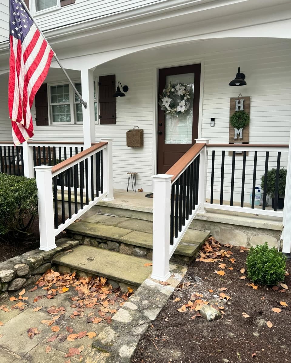 Finish carpentry by Farley Construction — new porch railing detail